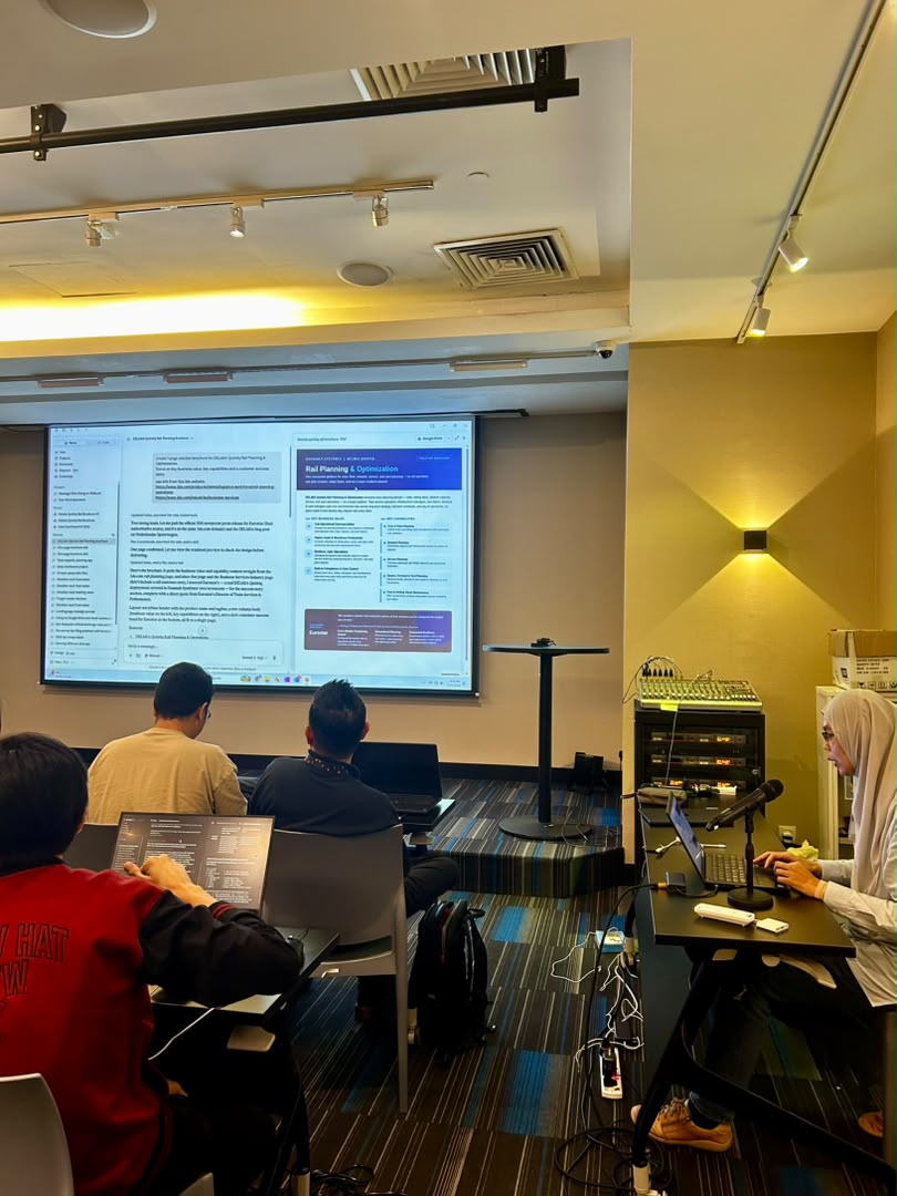 Malaysian professionals learning practical AI skills in an AITraining2U workshop