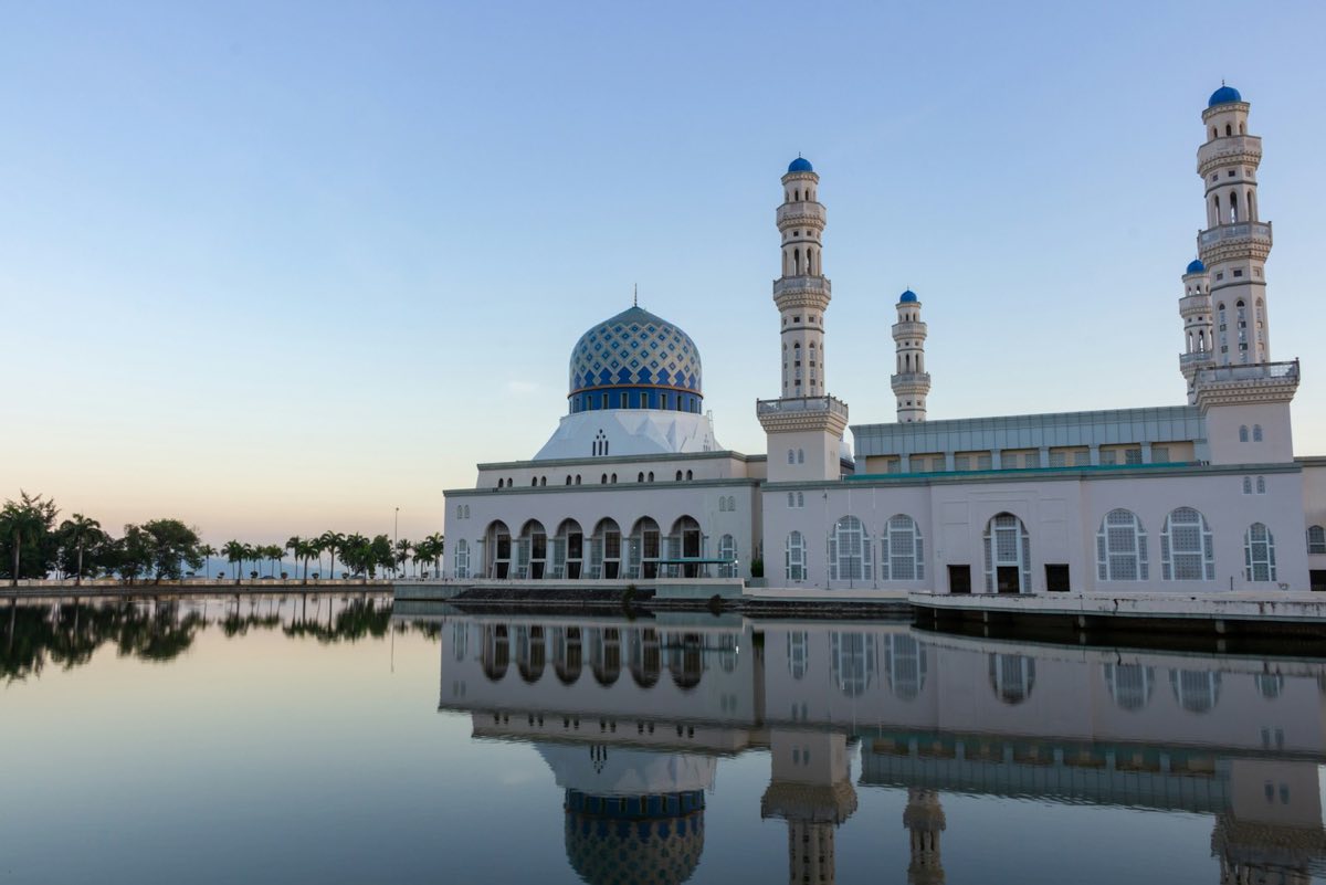 Kota Kinabalu City Mosque reflected at dawn, Sabah — AITraining2U HRDC-claimable corporate AI training in Kota Kinabalu